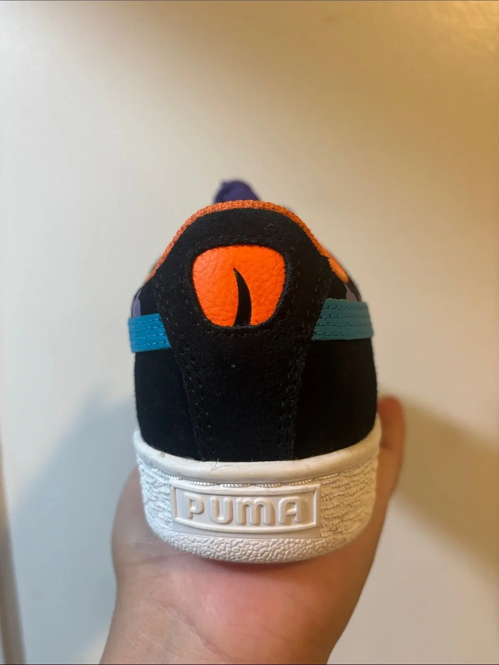 Puma Kids Black Sneakers with Purple Laces and Orange Interior Trim